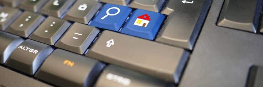 black keyboard with a search button and a home button