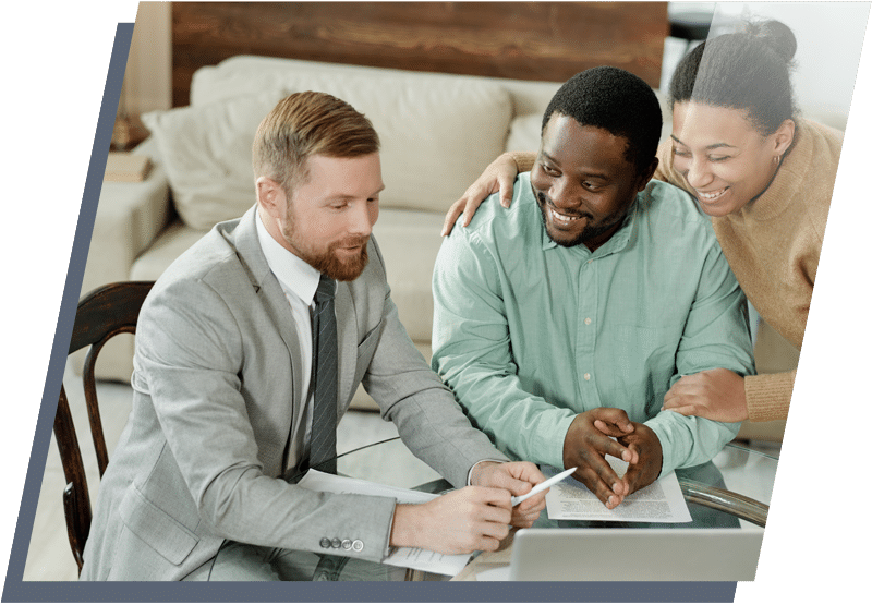 Young couple meeting with a professional and looking happy