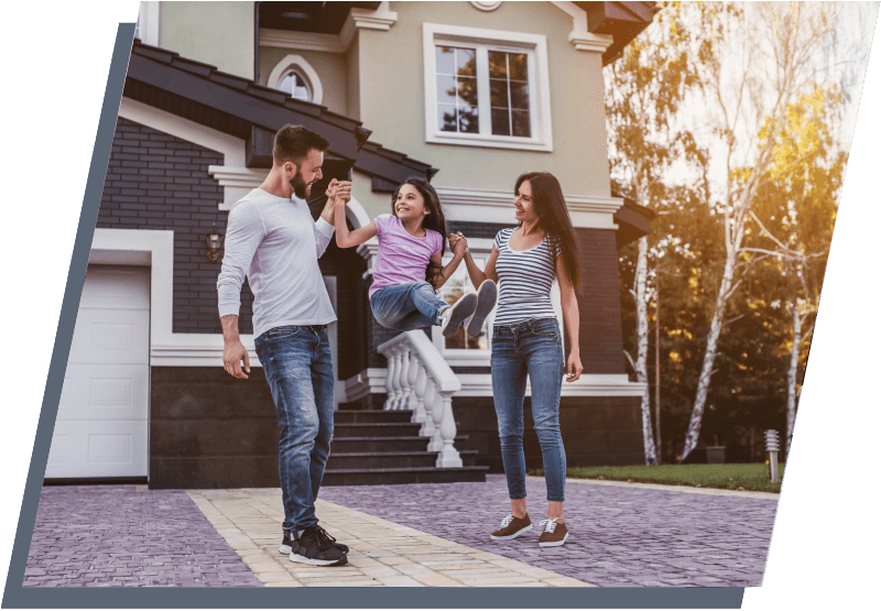 family in front of a house